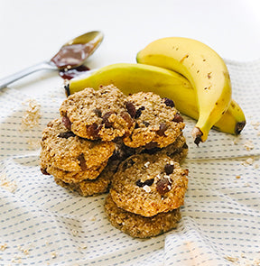 Oat and Banana Cookie with bananas and a spoon