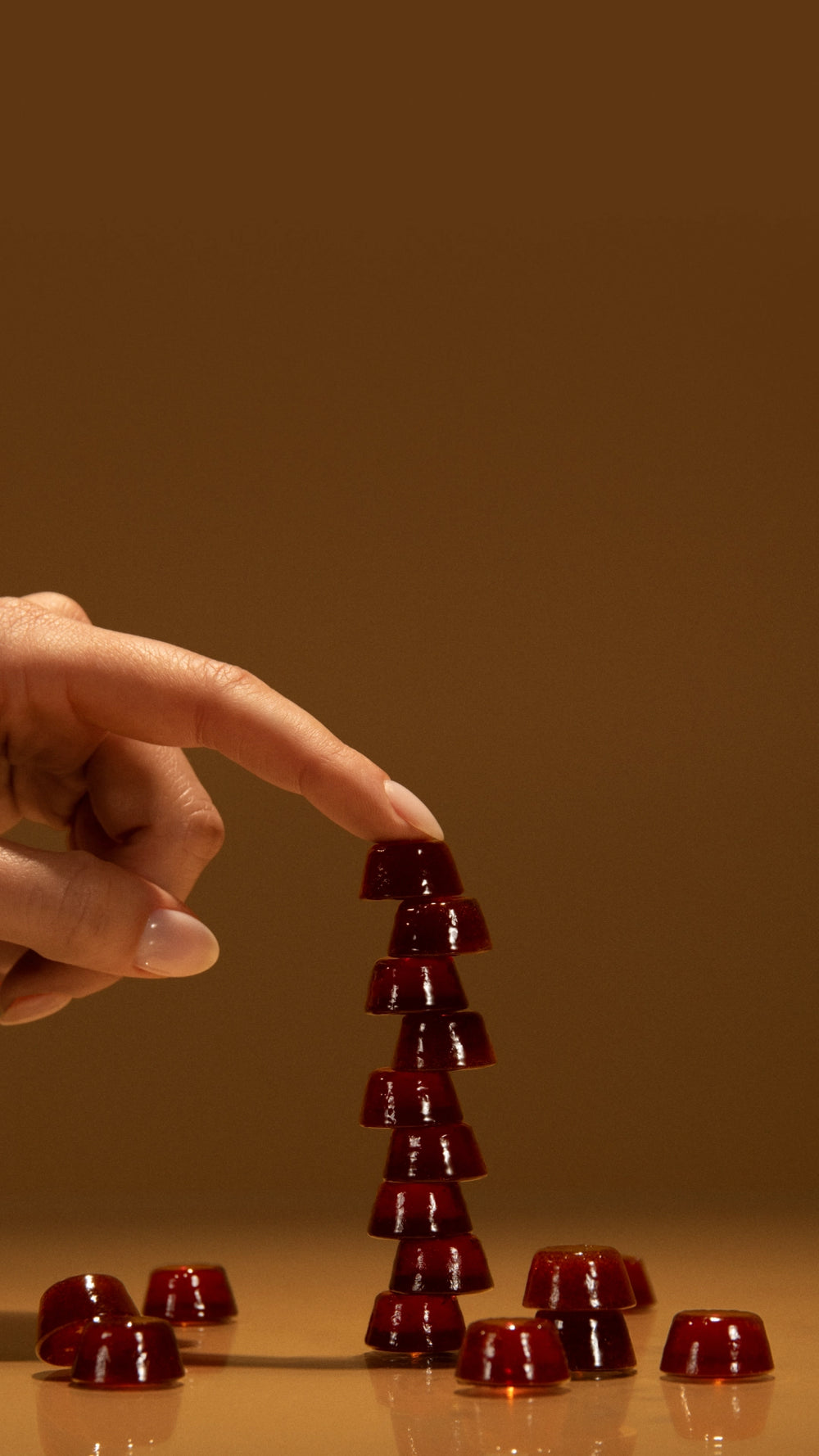 drops stacked with finger holding